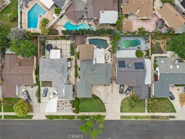16900 Mayall St, North Hills, CA 91343 - aerial perspective of suburban area with a pool