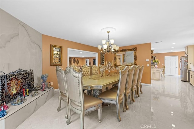 16900 Mayall St, North Hills, CA 91343 - dining space featuring a chandelier and baseboards