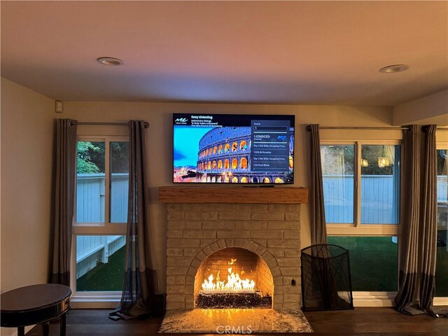 30724 Calle Resplendor, San Juan Capistrano, CA 92675 - detailed view of wood finished floors, baseboards, recessed lighting, and a fireplace