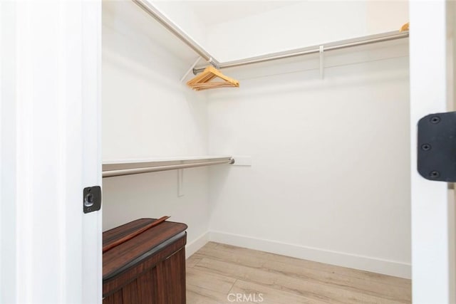 11911 Magnolia Blvd Unit 19, Valley Village, CA 91607 - spacious closet with light wood-style flooring