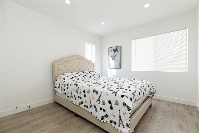 11911 Magnolia Blvd Unit 19, Valley Village, CA 91607 - bedroom featuring recessed lighting, light wood-style flooring, and baseboards