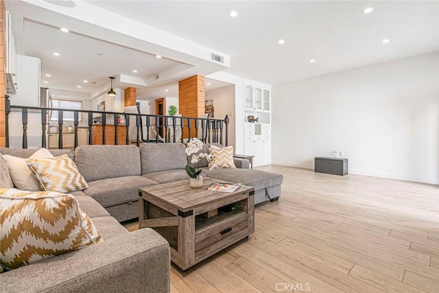 11911 Magnolia Blvd Unit 19, Valley Village, CA 91607 - living room featuring baseboards, light wood finished floors, and recessed lighting