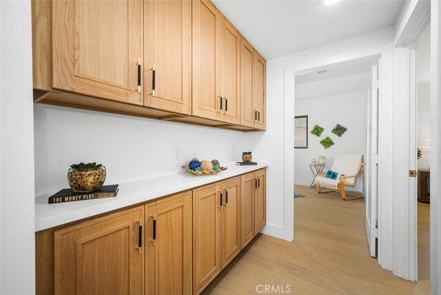 3209 Lakeknoll Dr, Fullerton, CA 92835 - bar area featuring light wood-style flooring