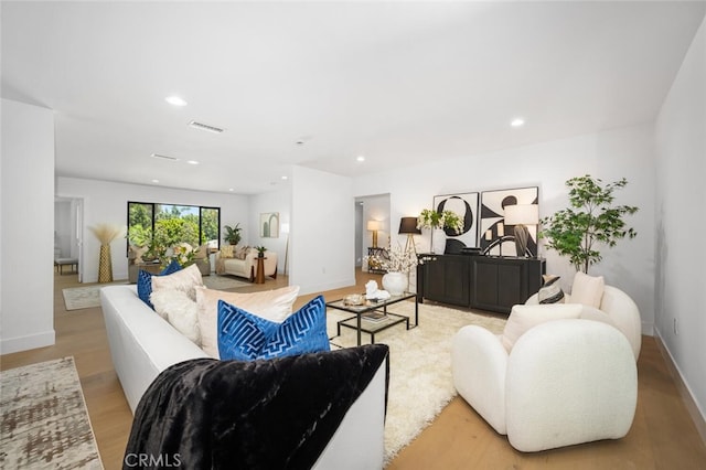 3209 Lakeknoll Dr, Fullerton, CA 92835 - living area with wood finished floors, baseboards, and recessed lighting