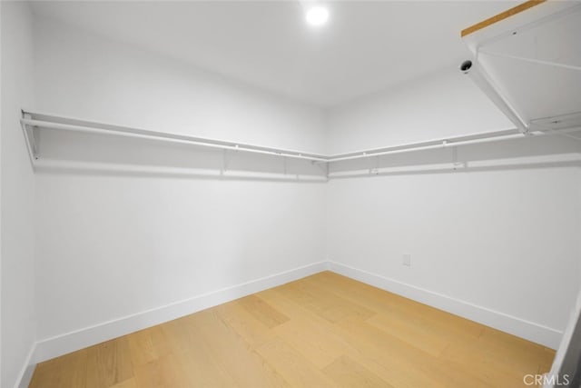 3209 Lakeknoll Dr, Fullerton, CA 92835 - spacious closet featuring wood finished floors