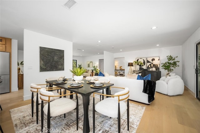 3209 Lakeknoll Dr, Fullerton, CA 92835 - dining space featuring light wood-style flooring, recessed lighting, and baseboards