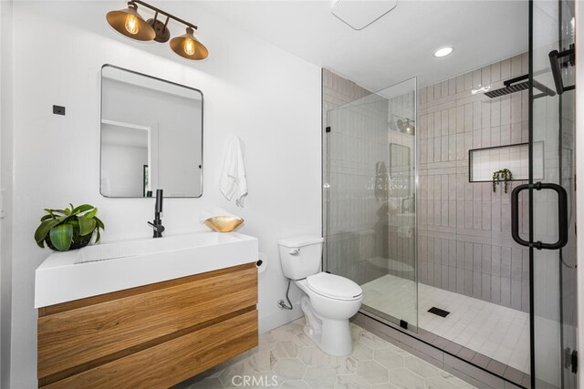 3209 Lakeknoll Dr, Fullerton, CA 92835 - bathroom with toilet, vanity, tile patterned flooring, a shower stall, and recessed lighting