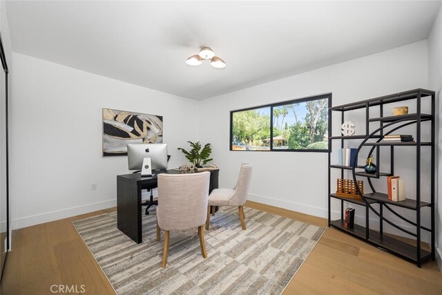 3209 Lakeknoll Dr, Fullerton, CA 92835 - home office featuring baseboards and wood finished floors