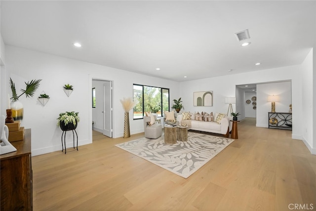 3209 Lakeknoll Dr, Fullerton, CA 92835 - living area with light wood finished floors, recessed lighting, and baseboards