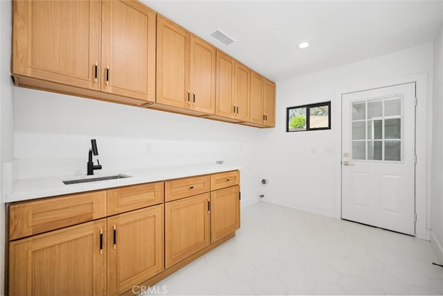 3209 Lakeknoll Dr, Fullerton, CA 92835 - laundry room featuring cabinet space, light floors, and recessed lighting