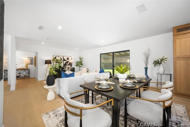 3209 Lakeknoll Dr, Fullerton, CA 92835 - dining area with light wood finished floors and recessed lighting
