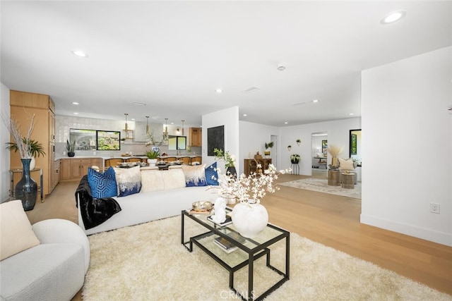 3209 Lakeknoll Dr, Fullerton, CA 92835 - living area with light wood finished floors and recessed lighting