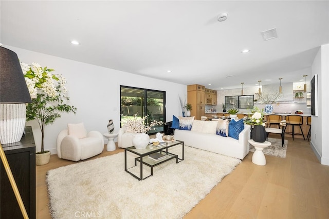 3209 Lakeknoll Dr, Fullerton, CA 92835 - living room with light wood-style flooring and recessed lighting