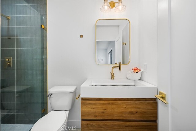 3209 Lakeknoll Dr, Fullerton, CA 92835 - bathroom featuring vanity, toilet, and tiled shower