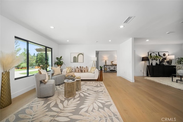 3209 Lakeknoll Dr, Fullerton, CA 92835 - living area featuring recessed lighting, baseboards, and light wood finished floors