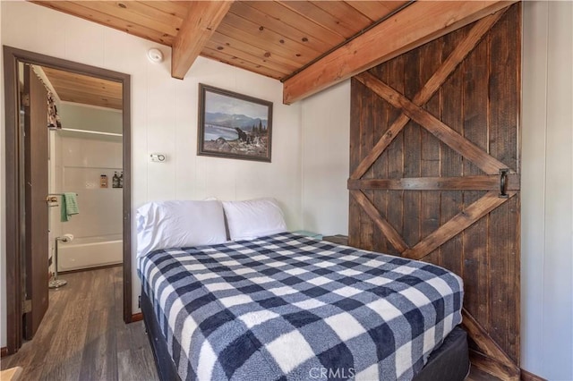 1100 Sugarloaf Blvd, Big Bear City, CA 92314 - bedroom with dark wood finished floors and wooden ceiling with exposed beams