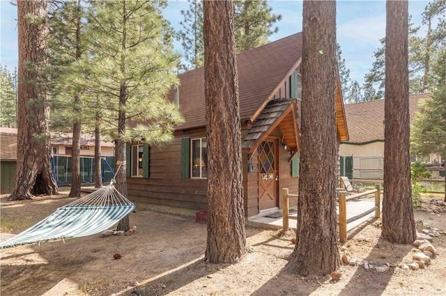 1100 Sugarloaf Blvd, Big Bear City, CA 92314 - rear view of property with roof with shingles