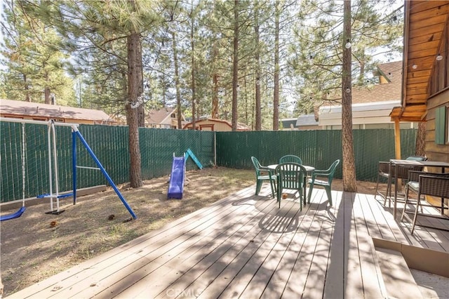 1100 Sugarloaf Blvd, Big Bear City, CA 92314 - wooden terrace with outdoor dining space and a fenced backyard