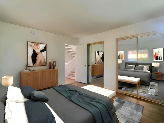 1295 Buenos Ave, San Diego, CA 92110 - bedroom featuring multiple closets and wood finished floors