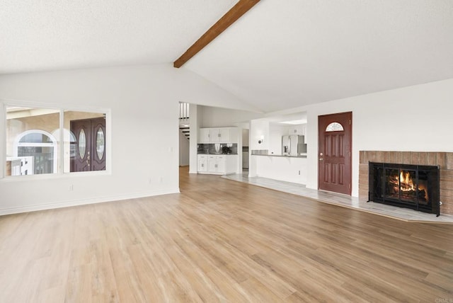 1295 Buenos Ave, San Diego, CA 92110 - unfurnished living room featuring a brick fireplace and light wood-style flooring