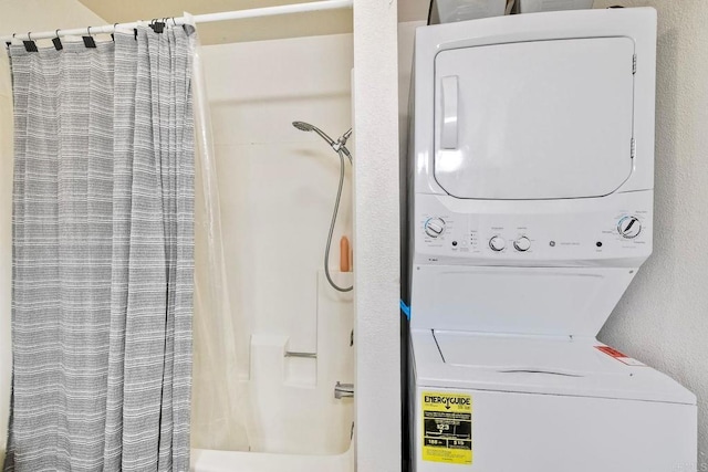 145 W El Norte Pkwy Unit 123, Escondido, CA 92026 - bathroom with stacked washer and clothes dryer and a heating unit