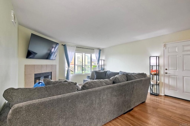 145 W El Norte Pkwy Unit 123, Escondido, CA 92026 - living room featuring wood finished floors and a fireplace