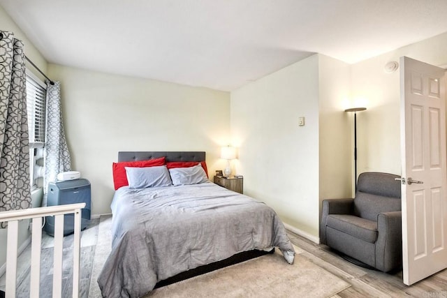 145 W El Norte Pkwy Unit 123, Escondido, CA 92026 - bedroom with wood finished floors and baseboards