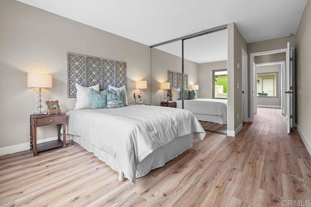 1810 Stanton Rd, Encinitas, CA 92024 - bedroom featuring wood finished floors and a closet