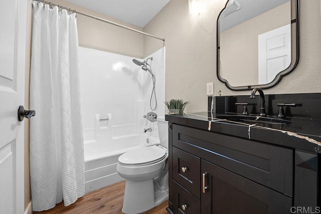 1810 Stanton Rd, Encinitas, CA 92024 - full bath with wood finished floors, vanity, shower / bath combo, and a textured wall