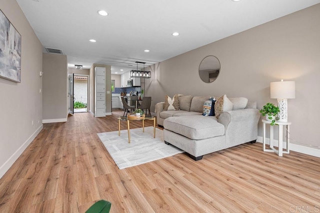 1810 Stanton Rd, Encinitas, CA 92024 - living area with recessed lighting and light wood-style floors