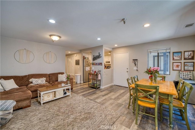 45 Stenner St Unit E, San Luis Obispo, CA 93405 - living area featuring wood finished floors, recessed lighting, and baseboards