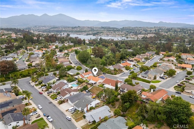 23291 Via Gaudix, Mission Viejo, CA 92691 - aerial overview of property's location with nearby suburban area and a water and mountain view