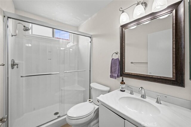 23291 Via Gaudix, Mission Viejo, CA 92691 - bathroom with a stall shower, toilet, and vanity