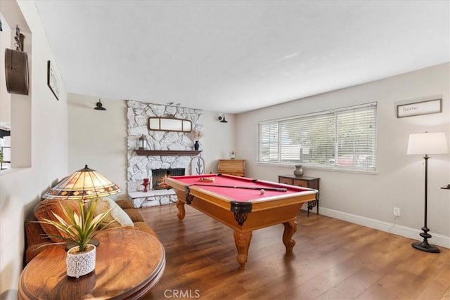 11029 Bel Air Ave, Ontario, CA 91762 - rec room featuring pool table, wood finished floors, and a stone fireplace