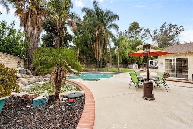 11029 Bel Air Ave, Ontario, CA 91762 - view of pool with a patio, a fenced backyard, and a storage shed