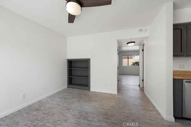 676 N 12th St Unit 3, Grover Beach, CA 93433 - empty room with wood finished floors, a ceiling fan, baseboards, and built in features