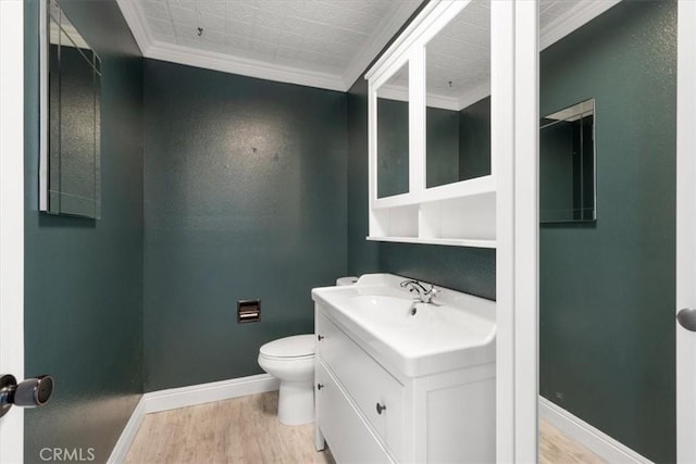676 N 12th St Unit 3, Grover Beach, CA 93433 - bathroom with wood finished floors, baseboards, vanity, toilet, and crown molding