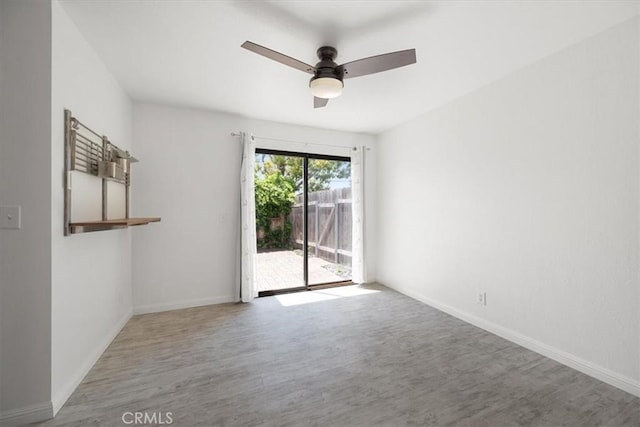 676 N 12th St Unit 3, Grover Beach, CA 93433 - unfurnished room featuring ceiling fan, wood finished floors, and baseboards