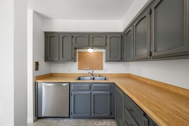 676 N 12th St Unit 3, Grover Beach, CA 93433 - kitchen with a sink, stainless steel dishwasher, and light countertops