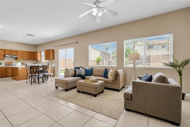 11868 Amethyst Ct, Jurupa Valley, CA 91752 - living room with ceiling fan, light tile patterned floors, and recessed lighting