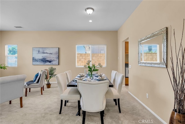 11868 Amethyst Ct, Jurupa Valley, CA 91752 - dining area with light colored carpet and baseboards