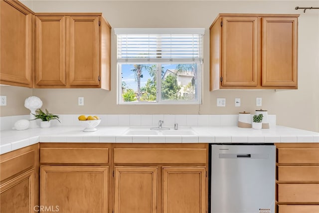 11868 Amethyst Ct, Jurupa Valley, CA 91752 - kitchen with stainless steel dishwasher, a sink, and light countertops