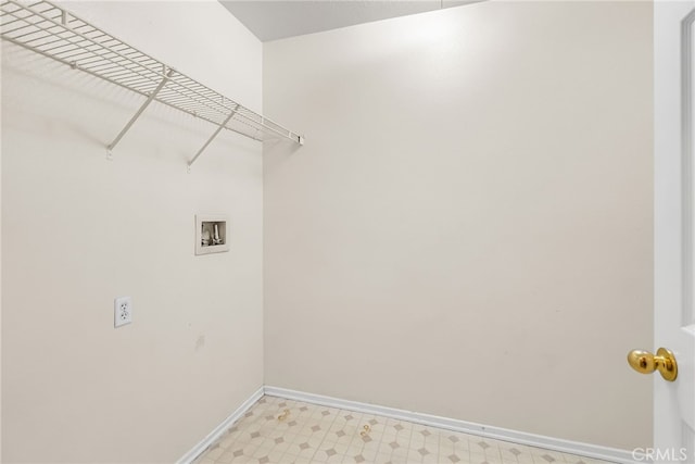 11868 Amethyst Ct, Jurupa Valley, CA 91752 - laundry room featuring washer hookup, baseboards, and light flooring