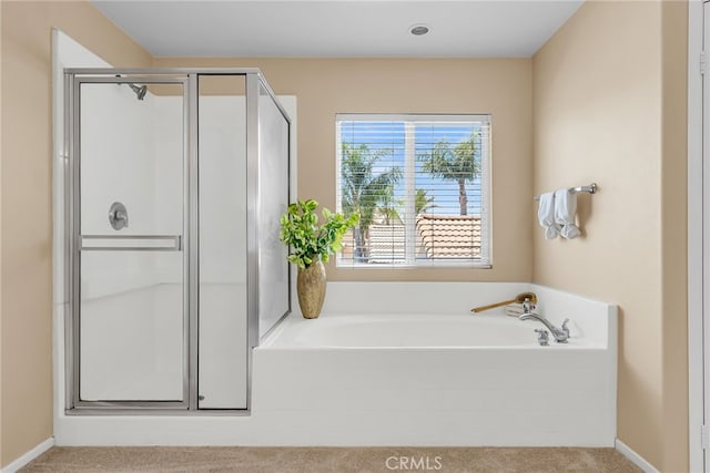 11868 Amethyst Ct, Jurupa Valley, CA 91752 - full bathroom with a stall shower, a garden tub, and baseboards