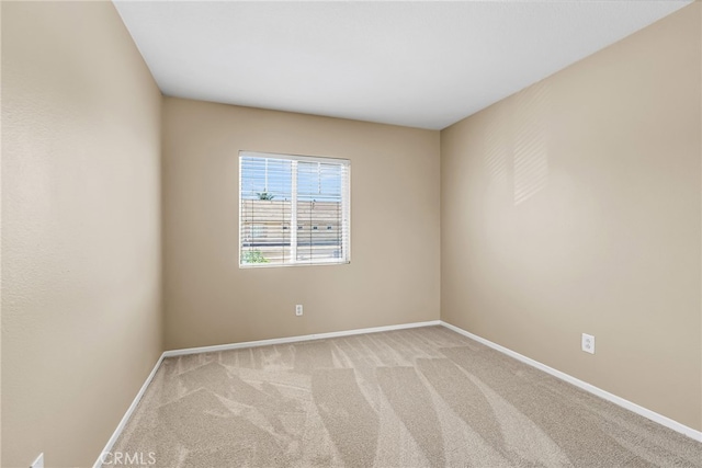 11868 Amethyst Ct, Jurupa Valley, CA 91752 - carpeted empty room with baseboards