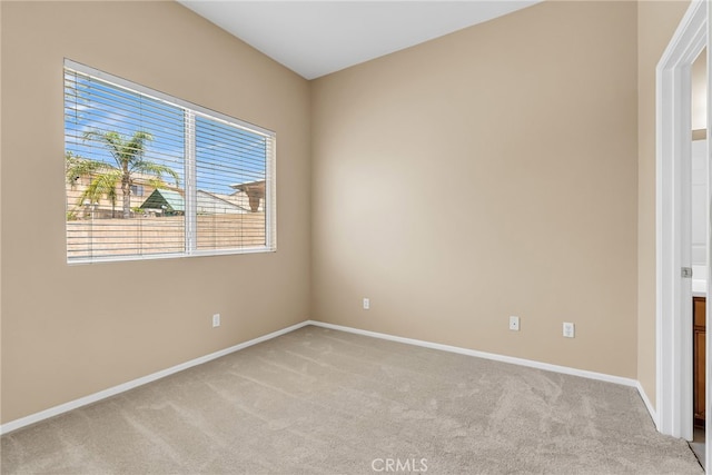 11868 Amethyst Ct, Jurupa Valley, CA 91752 - empty room with light carpet and baseboards