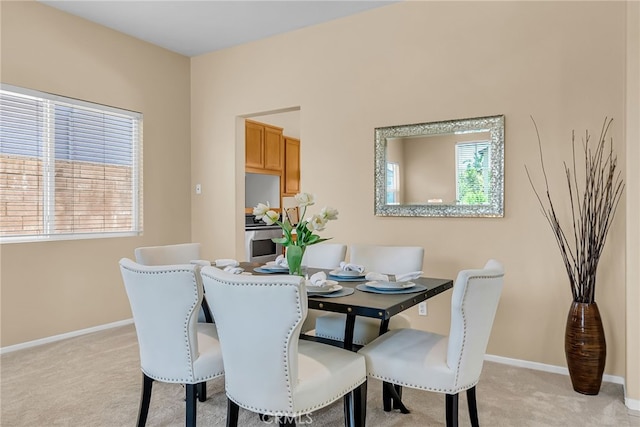 11868 Amethyst Ct, Jurupa Valley, CA 91752 - dining space with light carpet and baseboards