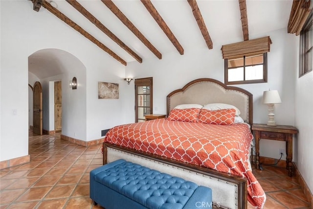 4950 Davenport Creek Rd, San Luis Obispo, CA 93401 - tiled bedroom featuring arched walkways and baseboards