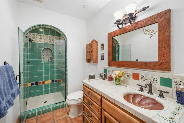 4950 Davenport Creek Rd, San Luis Obispo, CA 93401 - bathroom with a shower stall, vanity, decorative backsplash, and tile patterned flooring