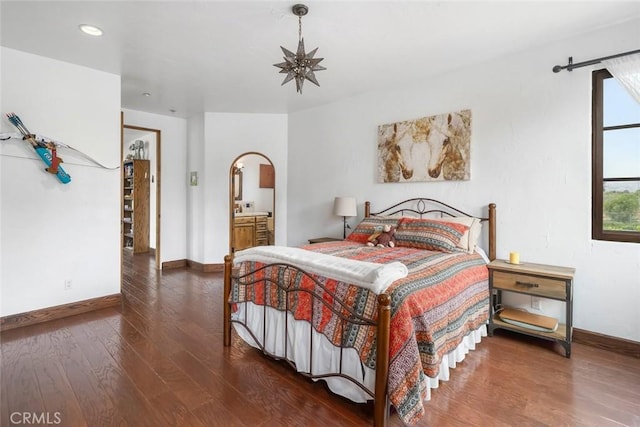4950 Davenport Creek Rd, San Luis Obispo, CA 93401 - bedroom featuring wood finished floors, arched walkways, and recessed lighting